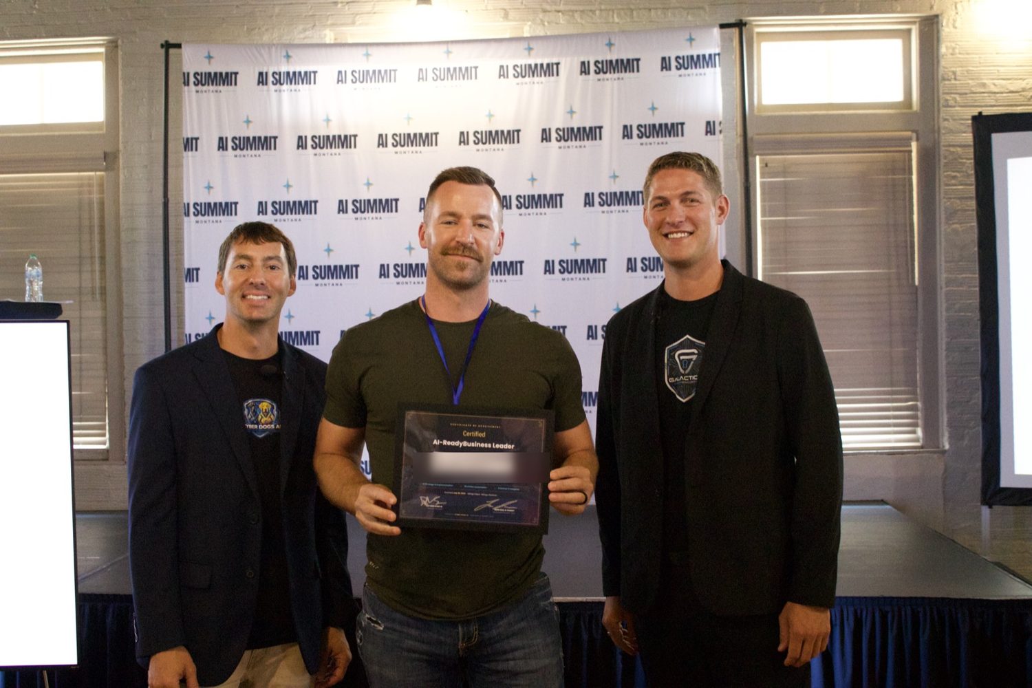 An attendee receiving their AI-Ready Business Leader certificate